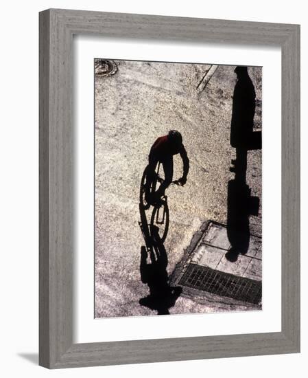 Shadow and Silhouette of Cyclistist and Pedestrian, New York, New York, USA-null-Framed Photographic Print