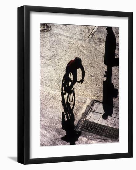 Shadow and Silhouette of Cyclistist and Pedestrian, New York, New York, USA-null-Framed Photographic Print