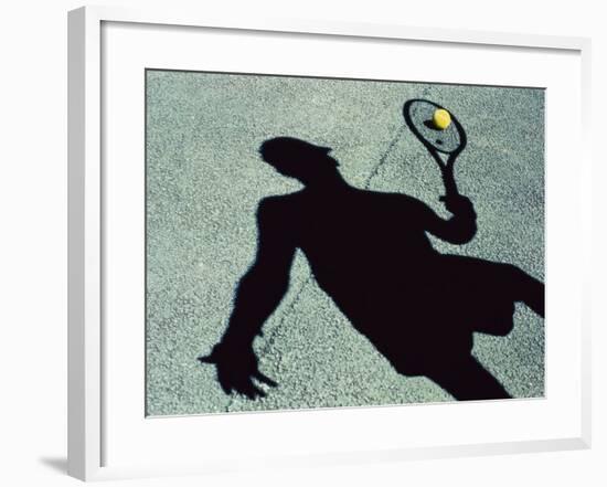 Shadow of a Male Tennis Player Playing Tennis-null-Framed Photographic Print