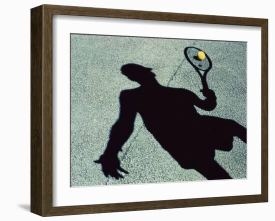 Shadow of a Male Tennis Player Playing Tennis-null-Framed Photographic Print