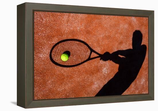 Shadow Of A Tennis Player In Action On A Tennis Court (Conceptual Image With A Tennis Ball-l i g h t p o e t-Framed Stretched Canvas