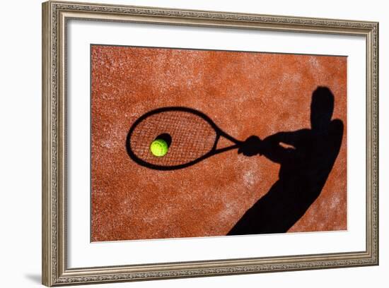 Shadow Of A Tennis Player In Action On A Tennis Court (Conceptual Image With A Tennis Ball-l i g h t p o e t-Framed Art Print