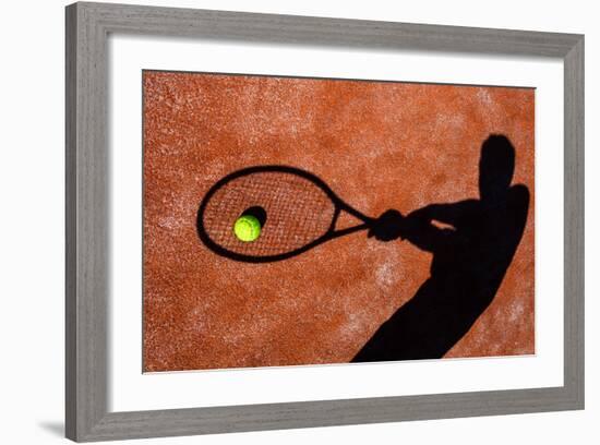 Shadow Of A Tennis Player In Action On A Tennis Court (Conceptual Image With A Tennis Ball-l i g h t p o e t-Framed Art Print