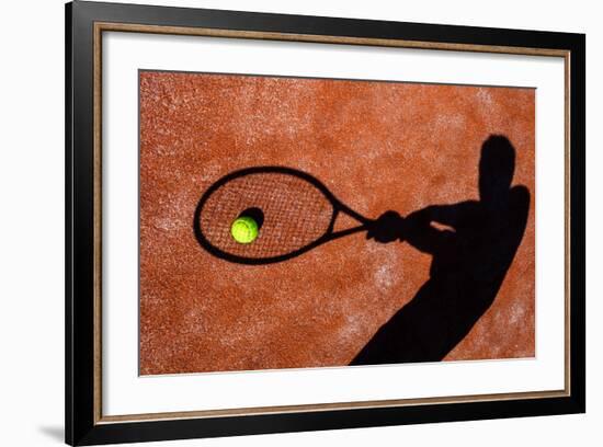 Shadow Of A Tennis Player In Action On A Tennis Court (Conceptual Image With A Tennis Ball-l i g h t p o e t-Framed Art Print