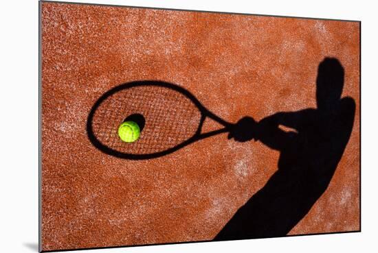 Shadow Of A Tennis Player In Action On A Tennis Court (Conceptual Image With A Tennis Ball-l i g h t p o e t-Mounted Art Print