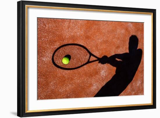 Shadow Of A Tennis Player In Action On A Tennis Court (Conceptual Image With A Tennis Ball-l i g h t p o e t-Framed Art Print
