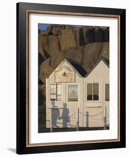 Shadow of Couple Walking Past Beach Huts, Granite Boulders, Cote De Granit Rose, Brittany-David Hughes-Framed Photographic Print