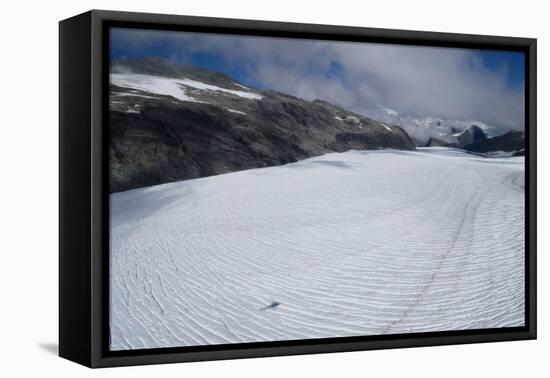 Shadow of helicopter flying over glacier, Mount Aspiring National Park, West Coast, South Island...-null-Framed Premier Image Canvas