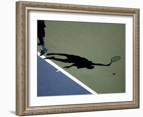 Shadow of Tennis Player Serving-null-Framed Photographic Print