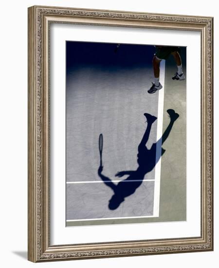 Shadow of Tennis Player Serving-null-Framed Photographic Print