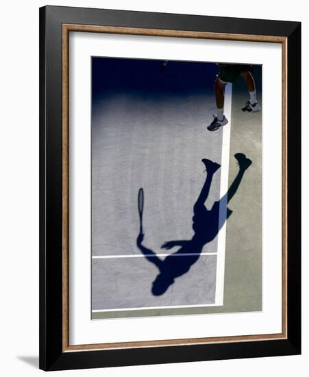 Shadow of Tennis Player Serving-null-Framed Photographic Print