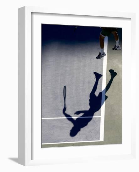 Shadow of Tennis Player Serving-null-Framed Photographic Print