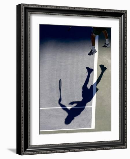 Shadow of Tennis Player Serving-null-Framed Photographic Print