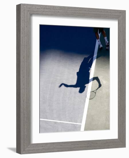 Shadow of Tennis Player Serving-null-Framed Photographic Print