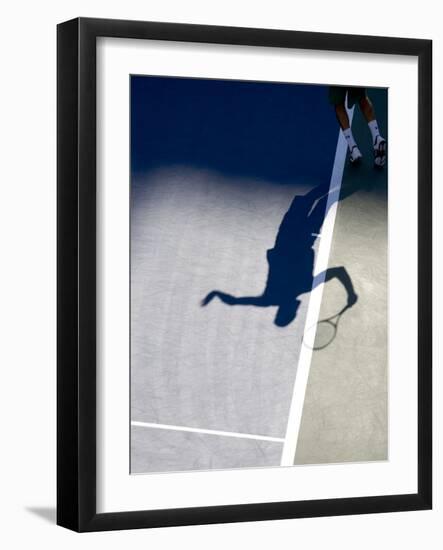 Shadow of Tennis Player Serving-null-Framed Photographic Print