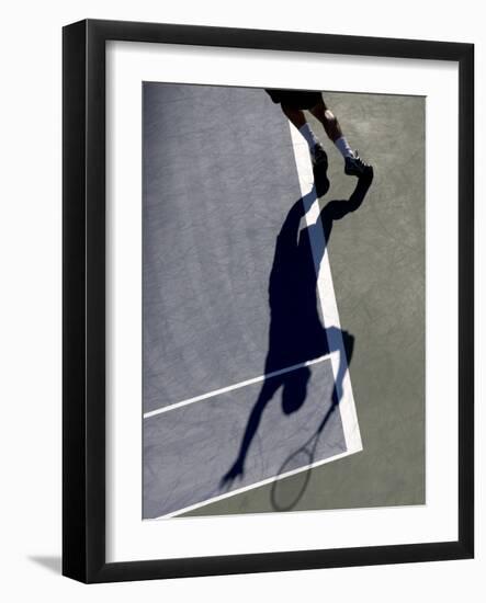 Shadow of Tennis Player Serving-null-Framed Photographic Print