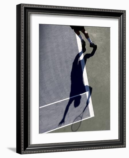 Shadow of Tennis Player Serving-null-Framed Photographic Print