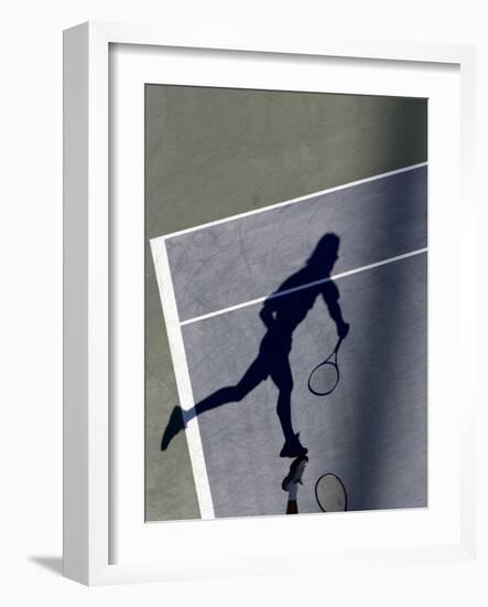 Shadow of Tennis Player Serving-null-Framed Photographic Print