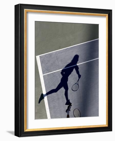 Shadow of Tennis Player Serving-null-Framed Photographic Print