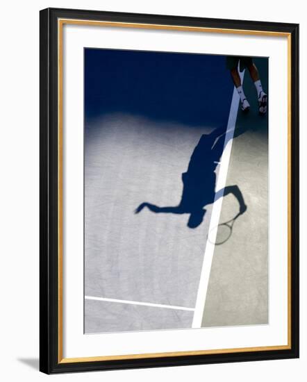 Shadow of Tennis Player Serving-null-Framed Photographic Print