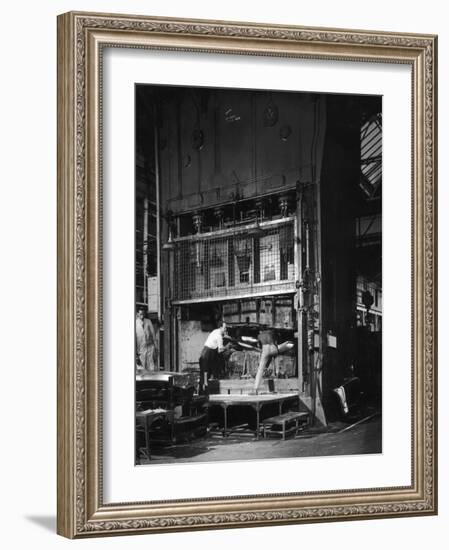 Shaping Metal Plate in a Large Hydraulic Press-Heinz Zinram-Framed Photographic Print