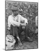 Sharecropper Bud Fields in his cotton patch in Hale County, Alabama, c.1936-Walker Evans-Mounted Photographic Print