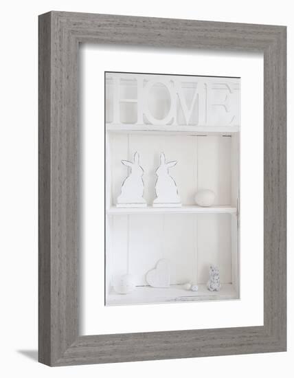 Shelf with Easter Bunnies and Writing 'Home'-Andrea Haase-Framed Photographic Print