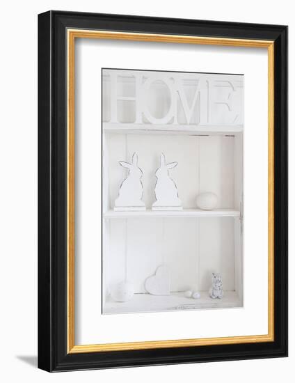 Shelf with Easter Bunnies and Writing 'Home'-Andrea Haase-Framed Photographic Print