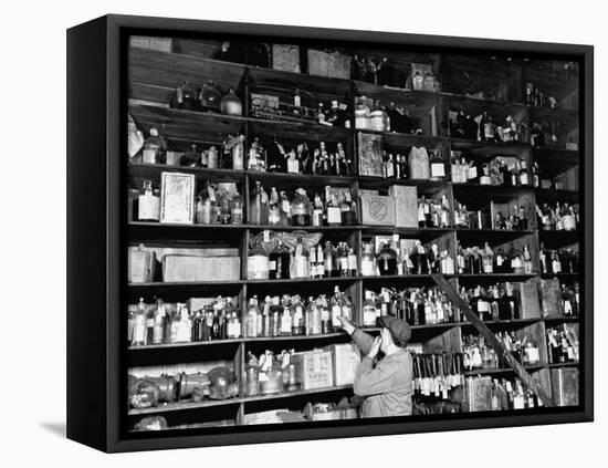 Shelves of Illegal Liquor Stored in the Nypd Property Clerks Office-Carl Mydans-Framed Premier Image Canvas