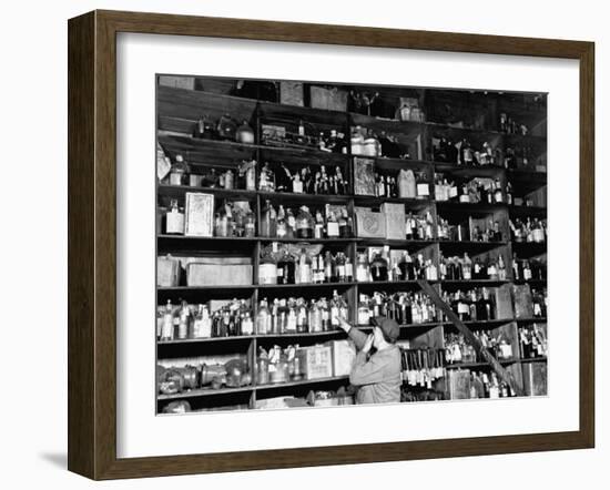 Shelves of Illegal Liquor Stored in the Nypd Property Clerks Office-Carl Mydans-Framed Photographic Print