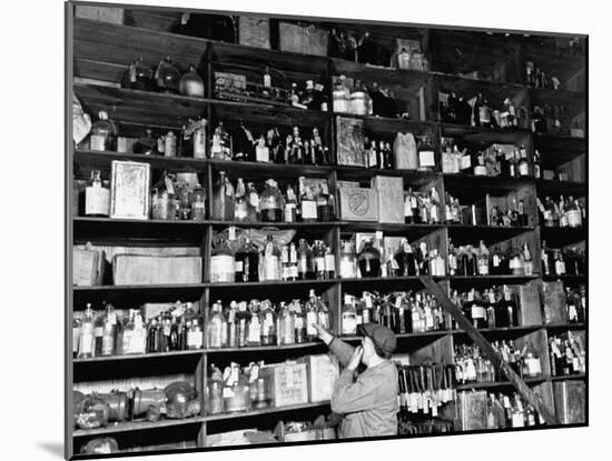 Shelves of Illegal Liquor Stored in the Nypd Property Clerks Office-Carl Mydans-Mounted Photographic Print