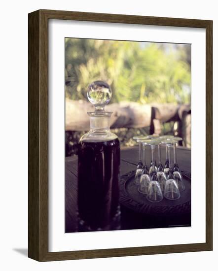 Sherry Bottle and Glasses at Jao Camp, Botswana-Stuart Westmoreland-Framed Photographic Print