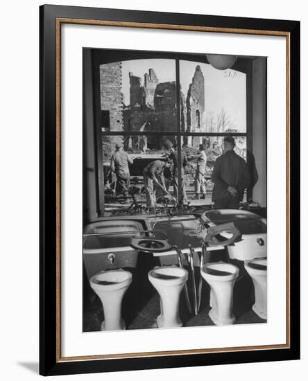 Shiny New Plumbing Displayed in Store-null-Framed Photographic Print