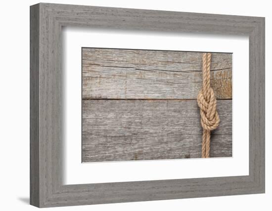 Ship Rope Knot on Old Wooden Texture Background-karandaev-Framed Photographic Print