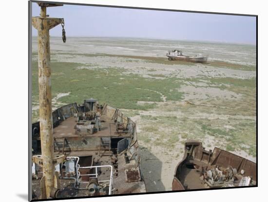 Ship's Graveyard Near Aralsk, on Seabed Due to Water Losses, Aral Sea, Kazakhstan, Central Asia-Anthony Waltham-Mounted Photographic Print