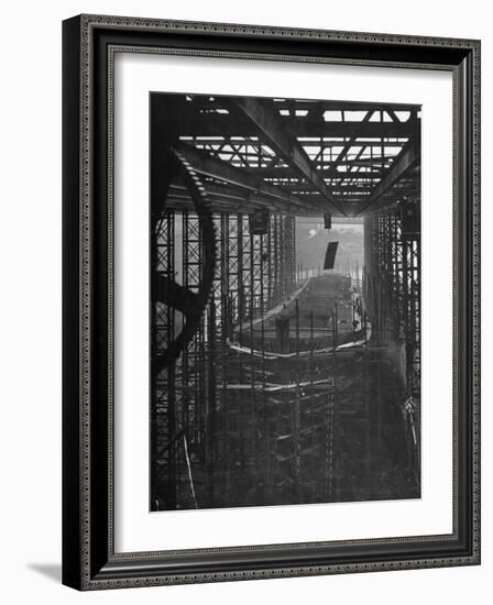 Shipbuilding, 10,000 Ton Merchantman Frames on Overhead Trolley Crane Dropping Plate into Position-William Vandivert-Framed Photographic Print