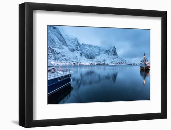 Ships Moored in the Small Harbor of Reine under a Gloomy Sky in the South of the Lofoten Islands-Roberto Moiola-Framed Photographic Print