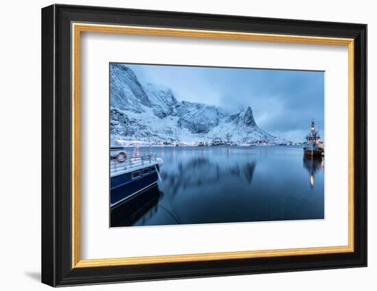 Ships Moored in the Small Harbor of Reine under a Gloomy Sky in the South of the Lofoten Islands-Roberto Moiola-Framed Photographic Print