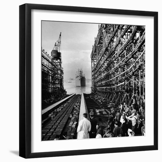 Shipyard Workers Watching as the "Bethlehem Fairchild" Launches Into the Water-Marie Hansen-Framed Photographic Print