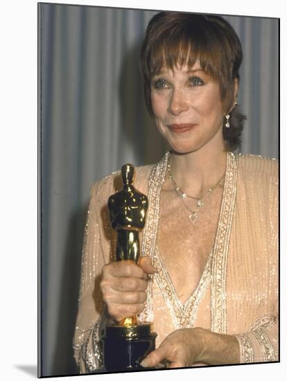Shirley MacLaine Holding Her Oscar in Press Room at Academy Awards-John Paschal-Mounted Premium Photographic Print