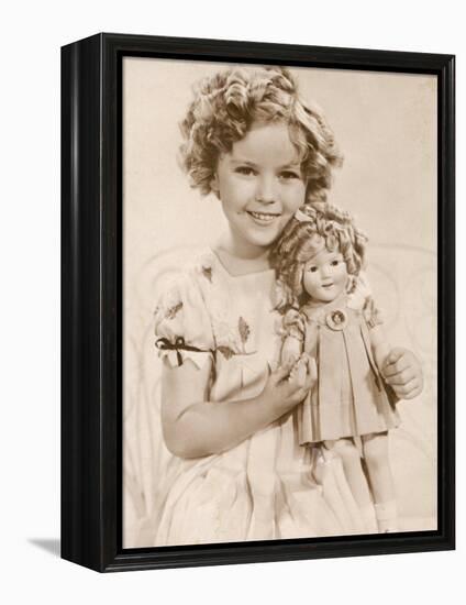 Shirley Temple American Child Star of the 1930s Seen Here with a Shirley Temple Doll-null-Framed Premier Image Canvas