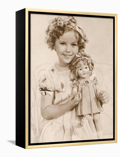 Shirley Temple American Child Star of the 1930s Seen Here with a Shirley Temple Doll-null-Framed Premier Image Canvas