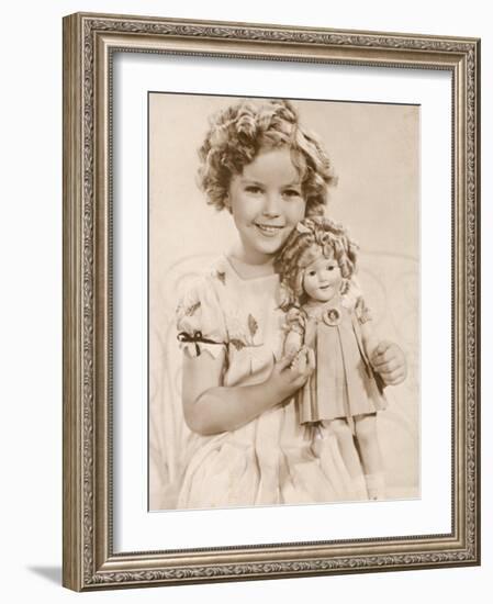 Shirley Temple American Child Star of the 1930s Seen Here with a Shirley Temple Doll-null-Framed Photographic Print