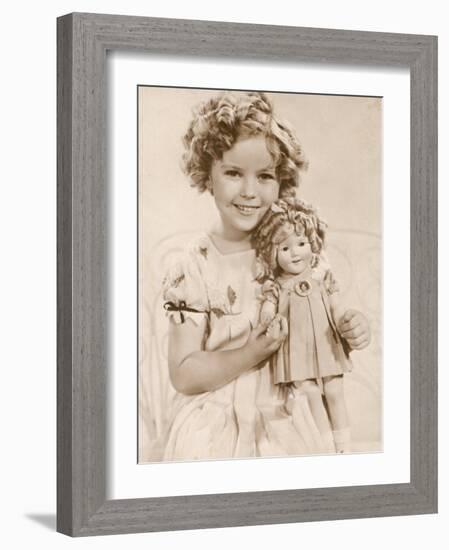 Shirley Temple American Child Star of the 1930s Seen Here with a Shirley Temple Doll-null-Framed Photographic Print