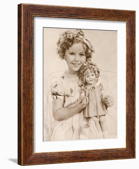 Shirley Temple American Child Star of the 1930s Seen Here with a Shirley Temple Doll-null-Framed Photographic Print