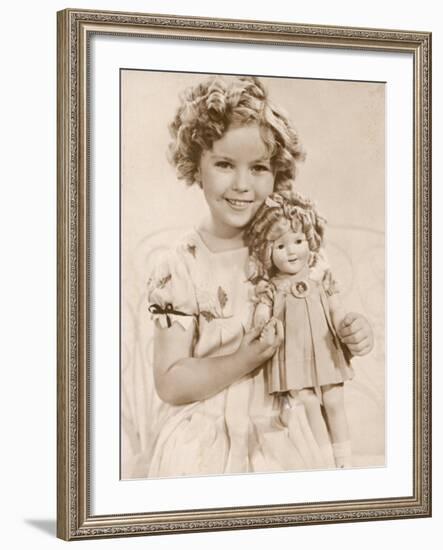 Shirley Temple American Child Star of the 1930s Seen Here with a Shirley Temple Doll-null-Framed Photographic Print