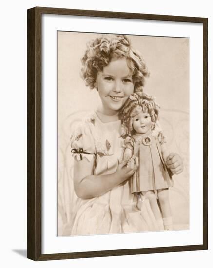 Shirley Temple American Child Star of the 1930s Seen Here with a Shirley Temple Doll-null-Framed Photographic Print