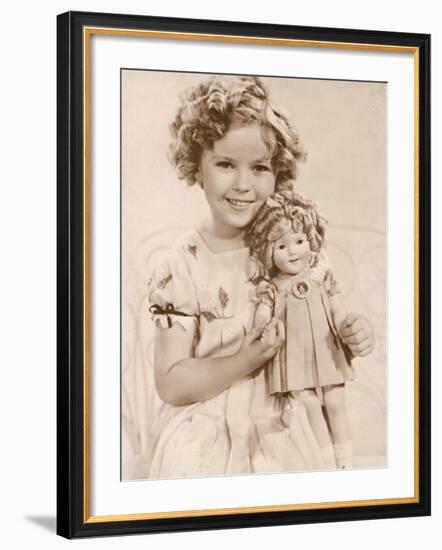 Shirley Temple American Child Star of the 1930s Seen Here with a Shirley Temple Doll-null-Framed Photographic Print