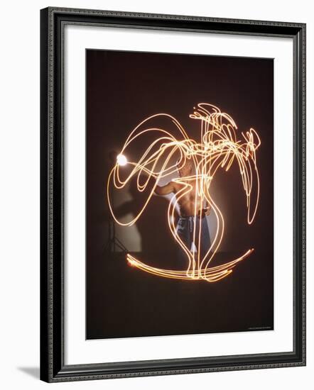 Shirtless Artist Pablo Picasso Creating Light Drawing of Vase of Flowers-Gjon Mili-Framed Premium Photographic Print