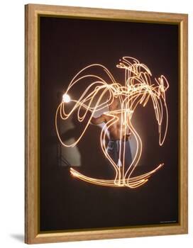 Shirtless Artist Pablo Picasso Creating Light Drawing of Vase of Flowers-Gjon Mili-Framed Premier Image Canvas